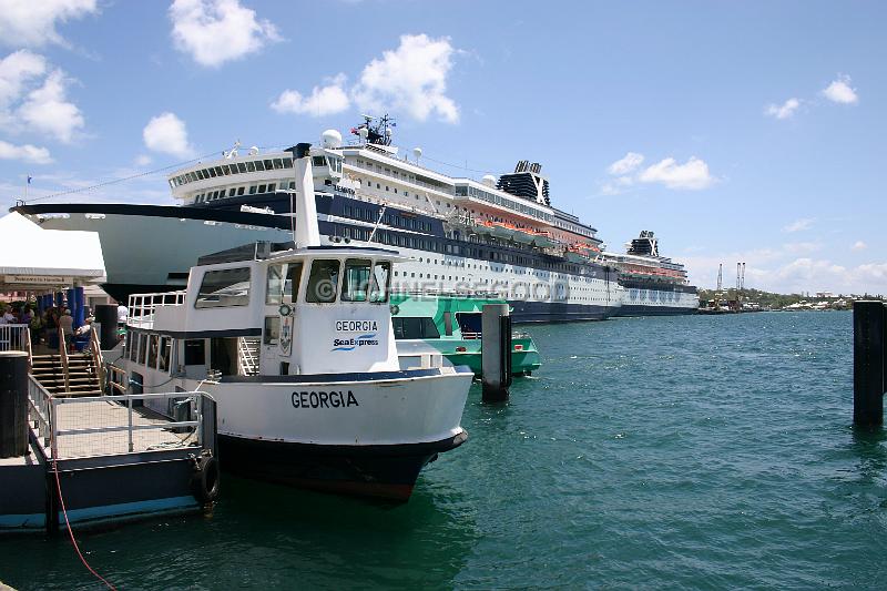 IMG_JE.FE18.JPG - Small ferry at terminal with Cruise Ships docked on Front Street, Bermuda